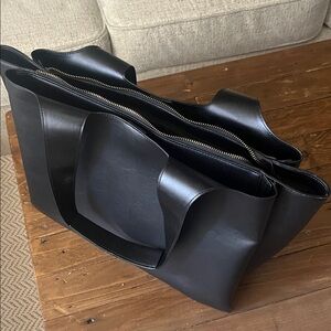 a new day Black Tote Bag